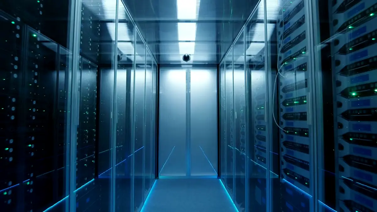 Rows of server racks inside a data center hall